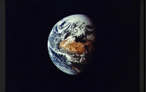Earth as seen the window of the Apollo Crew Module